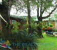 Exterior view of the charming villa nestled in the mountains of Puerto Plata