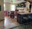 Spacious and inviting kitchen with cozy wooden finishes and mountain views