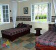 Interior shot bedroom showcasing the rustic charm and warm atmosphere of the family living spaces
