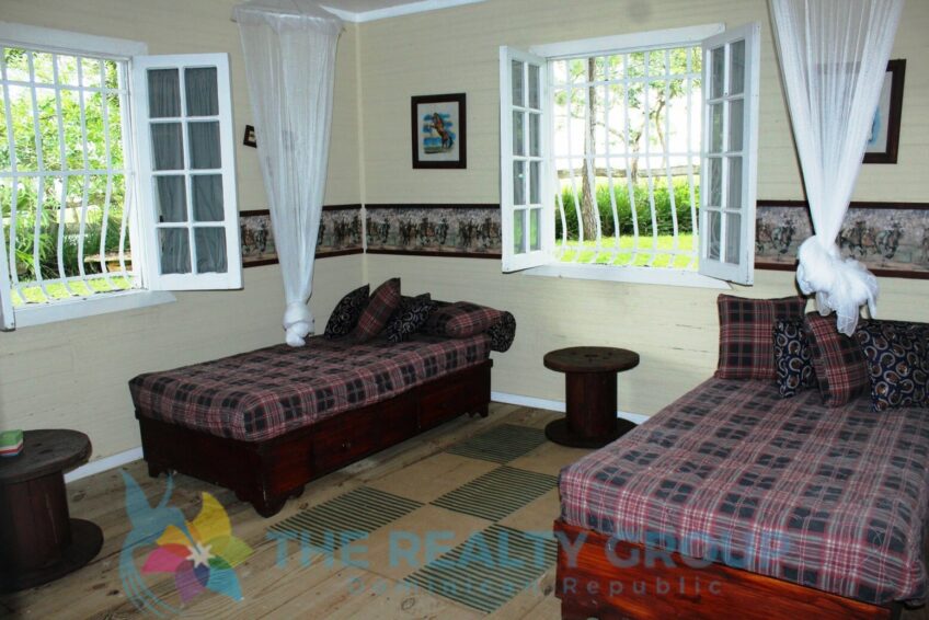Interior shot bedroom showcasing the rustic charm and warm atmosphere of the family living spaces