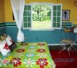 Interior shot bedroom showcasing the rustic charm and warm atmosphere of the family living spaces