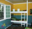 Rustic wooden bunk beds in the children