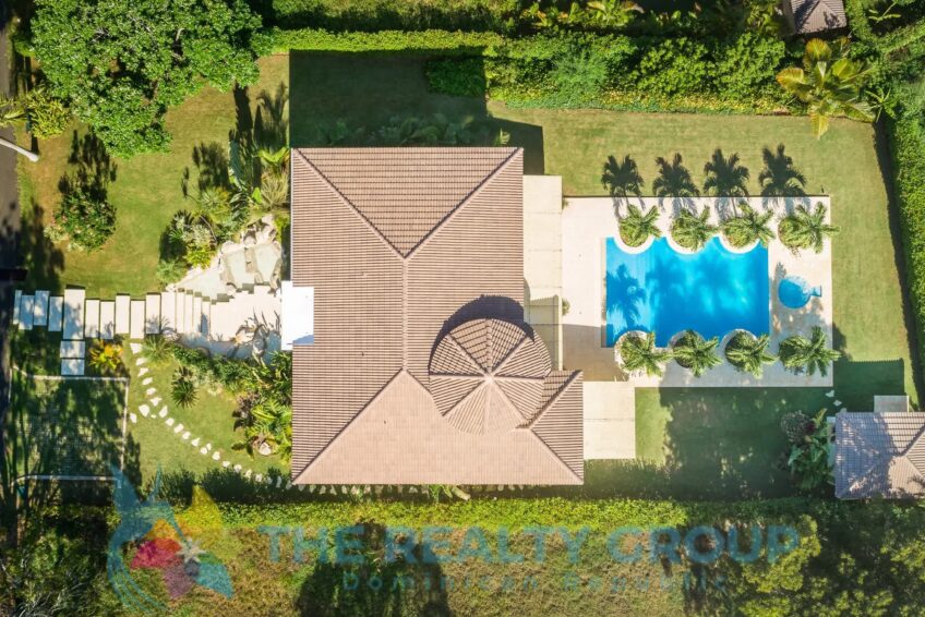 air photography from the complete lot, house, stylish pool and garden