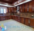 spacious kitchen with high quality wood.