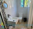 bathroom belonging by the separate bedroom