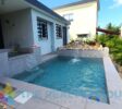 Enjoy a small pool, Jacuzzi, and pizza oven in the beautifully designed cacti garden of this Sosúa villa.