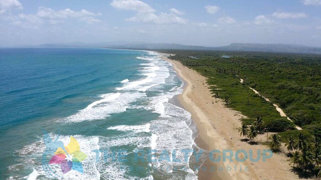 Breathtaking ocean view from the beach near the 4000 m² (43,056 sq/ft) lot for sale in La Boca, Dominican Republic. Ideal location for relaxation and enjoyment. Listed by The Realty Group.