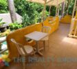 Studio Building: A two-level structure with five well-appointed studios, each with a kitchenette, full bathroom, and private terrace, ideal for guest comfort
