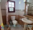 Studio Building: A two-level structure with five well-appointed studios, each with a kitchenette, full bathroom, and private terrace, ideal for guest comfort