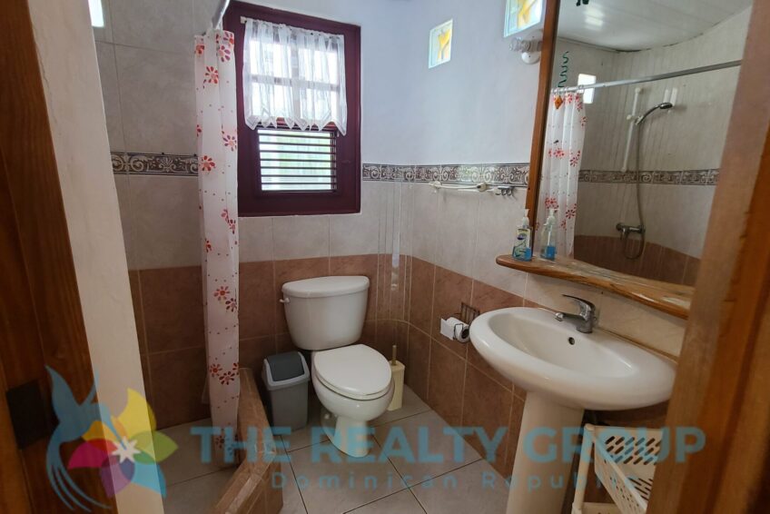 Studio Building: A two-level structure with five well-appointed studios, each with a kitchenette, full bathroom, and private terrace, ideal for guest comfort
