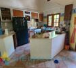 kitchen area in the main villa with high ceilings