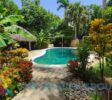 Relax by the beautiful kidney-shaped pool, just a minute