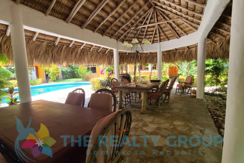 Relax by the beautiful kidney-shaped pool, just a minute