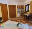 Cozy studio with kitchenette and private terrace, perfect for guests seeking a comfortable and self-sufficient stay