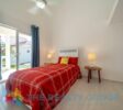 Peaceful villa Sosúa with view of the bedroom with entrance to terrace