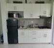Fully equipped kitchen in Sosúa condos for sale with modern appliances