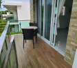 Covered terrace in Sosúa condos for sale overlooking private garden