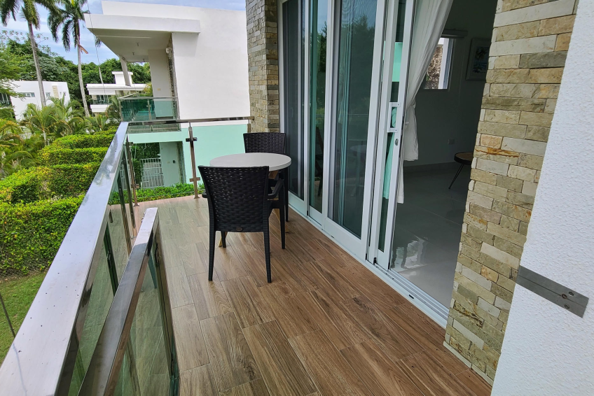 Covered terrace in Sosúa condos for sale overlooking private garden