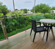 Covered terrace in Sosúa condos for sale overlooking private garden