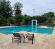 Large shared pool in gated Sosúa condos for sale perfect for leisure and guests