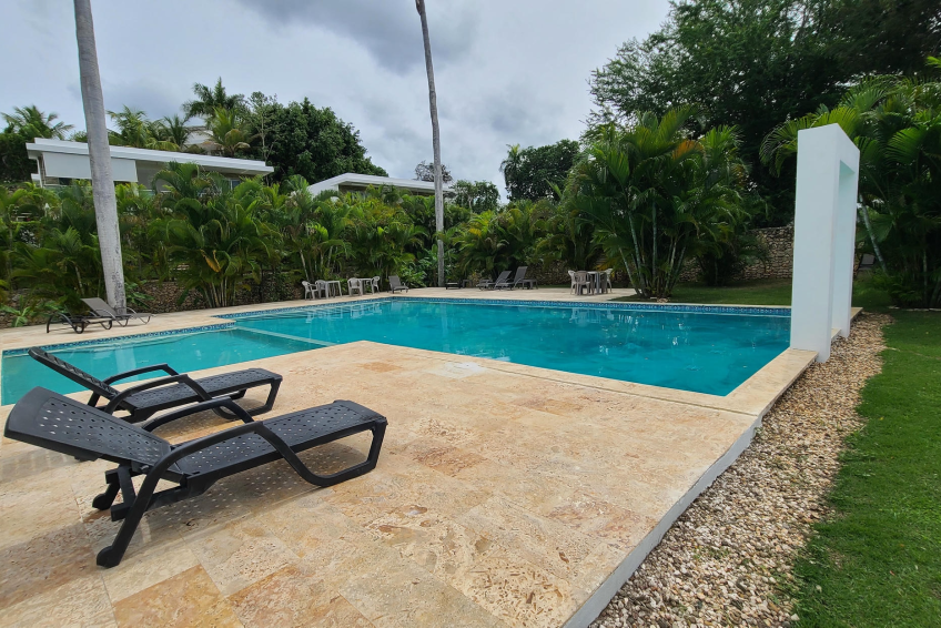 Large shared pool in gated Sosúa condos for sale perfect for leisure and guests