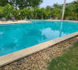 Large shared pool in gated Sosúa condos for sale perfect for leisure and guests