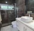 Modern bathroom in Sosúa condos for sale with walk-in shower and stylish fixtures