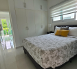 Spacious bedroom in Sosúa condos for sale with natural light and air conditioning