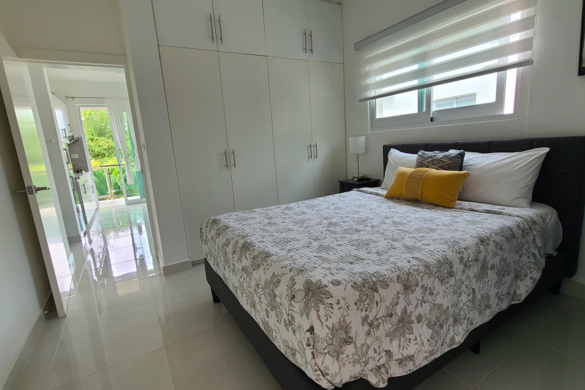Spacious bedroom in Sosúa condos for sale with natural light and air conditioning