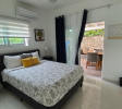 Spacious bedroom in Sosúa condos for sale with natural light and air conditioning