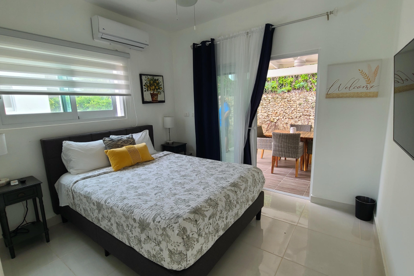 Spacious bedroom in Sosúa condos for sale with natural light and air conditioning