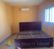 Bedroom with air conditioner in fixer-upper in Cabarete East