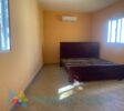 Bedroom with air conditioner in fixer-upper in Cabarete East