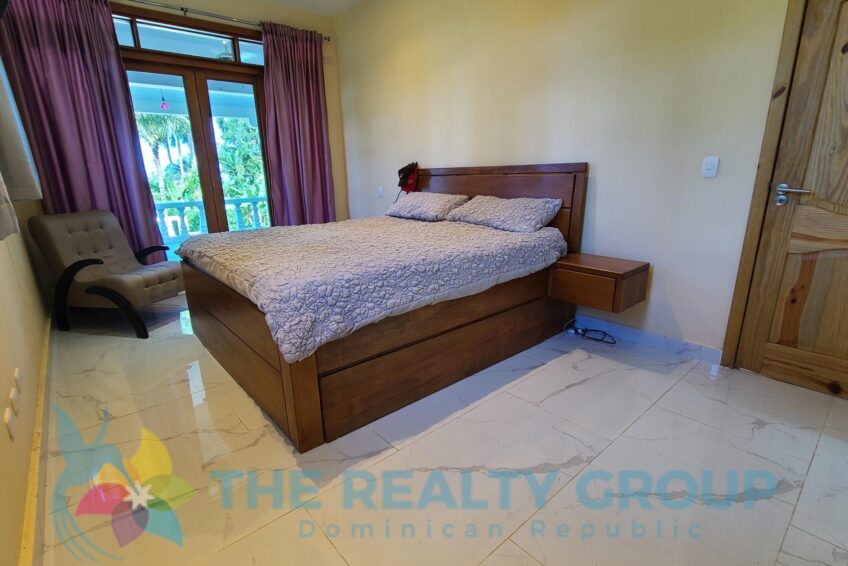 Elegant master bedroom with ensuite bathroom in a beautiful villa with apartment and studio in Sosúa