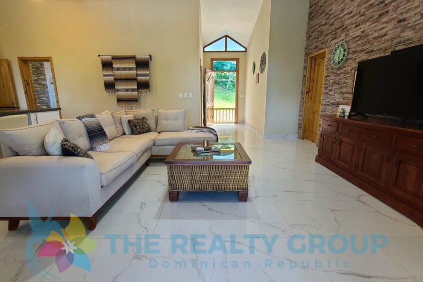 Spacious living room and modern kitchen inside a beautiful villa with apartment and studio in Sosúa