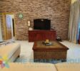 Spacious living room and modern kitchen inside a beautiful villa with apartment and studio in Sosúa