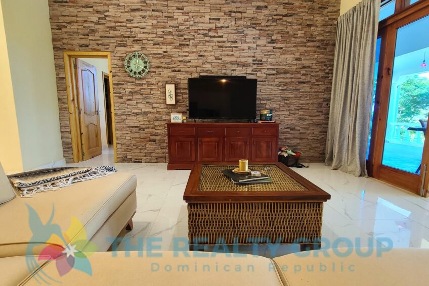 Spacious living room and modern kitchen inside a beautiful villa with apartment and studio in Sosúa