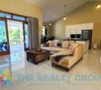 Spacious living room and modern kitchen inside a beautiful villa with apartment and studio in Sosúa