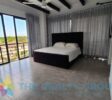 Rizz Sosúa Condo Sale Expansive bedroom in the one bedroom apartment