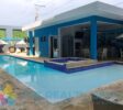 Rizz Sosúa Condo Sale complex with swimming pool and gym