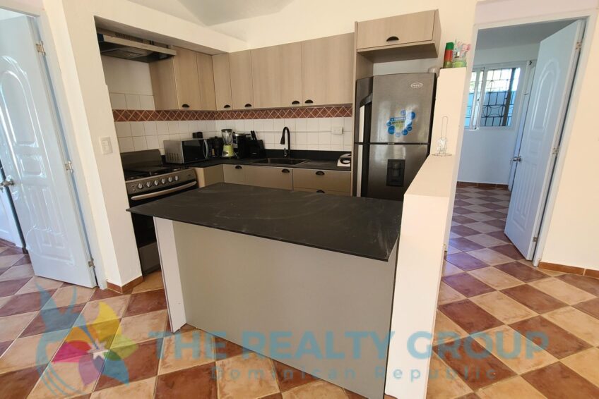 Caribbean villa Playa Chiquita interior view of the open living and kitchen
